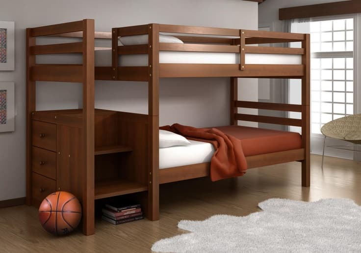 Wooden bunk bed with bedding